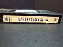 Load image into Gallery viewer, Dangerously Close (1990 VHS) John Stockwell, J. Eddie Peck, Carey Lowell