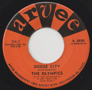 The Olympics : Dance By The Light Of The Moon / Dodge City (7", Single)