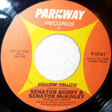 Load image into Gallery viewer, Senator Bobby &amp; Senator Everett McKinley / Bobby The Poet : Mellow Yellow / White Christmas (3 O'Clock Weather Report) (7")
