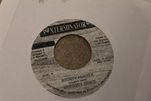 Load image into Gallery viewer, Gregory Isaacs : Bounty Hunter (7")